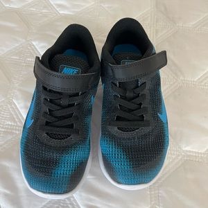 Nike boys size 11.5 sneakers. Never worn.